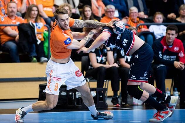 180324 Kristianstads Tore Stig Moen Nilsen och Flensburgs Jim Gottfridsson under handbollsmatchen i Champions League mellan Kristianstad och Flensburg den 24 mars 2018 i Kristianstad. Copyright: AvdoxBilkanovic BB180324AB014