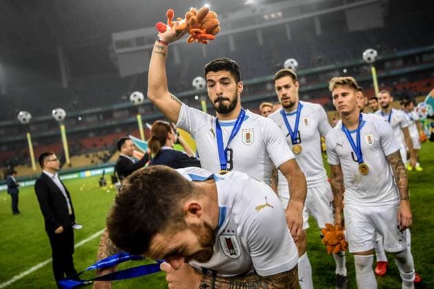 Players of Uruguay national football team take part in the champion award ceremony for the 2018 Gree China Cup International Football Championship in Nanning city, south China s Guangxi Zhuang Autonomous Region, 26 March 2018. Uruguay won the final by 1-0 against Wales and claimed the title of the event. Uruguay claims title of 2018 China Cup Int l Football Championship in Nanning  20180326_10051