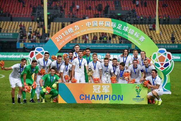 Players of Uruguay national football team take part in the champion award ceremony for the 2018 Gree China Cup International Football Championship in Nanning city, south China s Guangxi Zhuang Autonomous Region, 26 March 2018. Uruguay won the final by 1-0 against Wales and claimed the title of the event. Uruguay claims title of 2018 China Cup Int l Football Championship in Nanning  20180326_29618