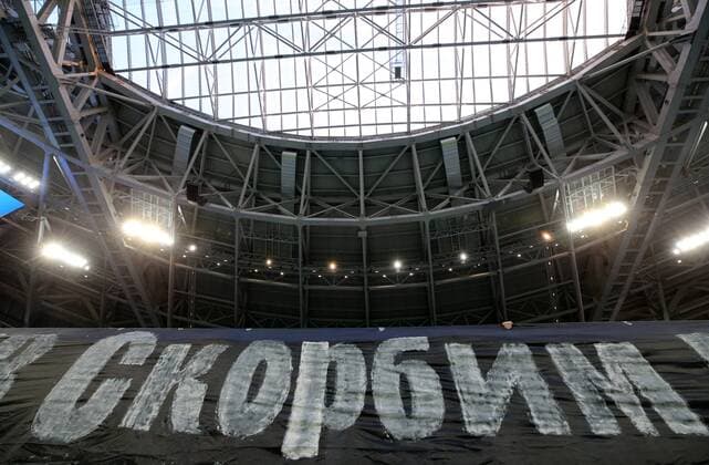 ST PETERSBURG, RUSSIA - MARCH 27, 2018: A banner reading We are in mourning in memory of the Kemerovo shopping mall fire victims at Saint Petersburg Stadium ahead of a friendly football match between Russia and France. Alexander Demianchuk TASS  TS0799B8