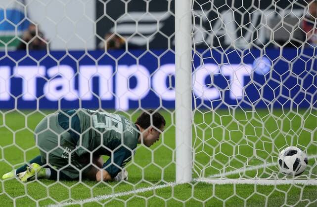 ST PETERSBURG, RUSSIA - MARCH 27, 2018: Russia s goalkeeper Andrei Lunev who has conceded a goal in a friendly football match against France at Saint Petersburg Stadium. Alexander Demianchuk TASS  TS079A11