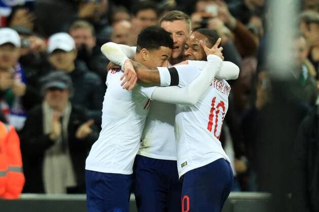 27th March 2018, Wembley Stadium, London, England; International Football Friendly, England versus Italy; Jamie Vardy of England celebrates with Raheem Sterling and Jesse Lingard as he scores making it 1-0 in the 26th minute  ActionPlus12006074