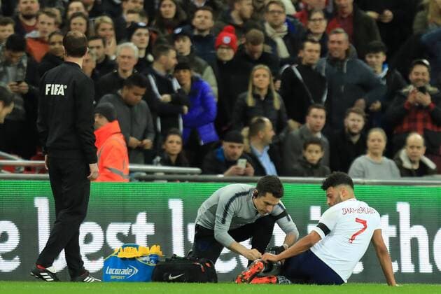 27th March 2018, Wembley Stadium, London, England; International Football Friendly, England versus Italy; Alex Oxlade-Chamberlain of England receives treatment for an injury  ActionPlus12006077