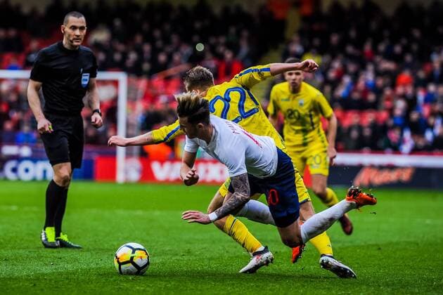 Standard Liege s midfielder Valeriy Luchkevych (22) for Ukraine U21 U 21 s fouls Norwich City s forward James Maddison (10) for England U21 s during the International Euro U21 Qualification match between England U21 and Ukraine U21 at Bramall Lane, Sheffield, England on 27 March 2018. Copyright: xStephenxBuckleyx PMI-1923-0046