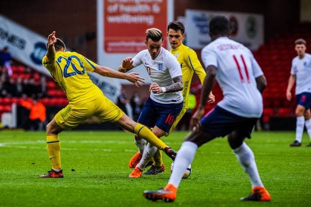 FC Shakhtar Donetsk s midfielder Oleksandr Pikhalyonok (20) for Ukraine U21 U 21 s takes the ball off Norwich City s forward James Maddison (10) for England U21 s during the International Euro U21 Qualification match between England U21 and Ukraine U21 at Bramall Lane, Sheffield, England on 27 March 2018. Copyright: xStephenxBuckleyx PMI-1923-0051