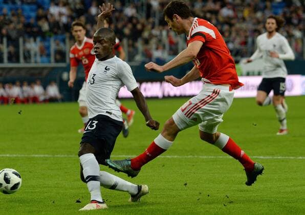 Fußball, Länderspiel, Russland - Frankreich Russia. St. Petersburg. March 27, 2018. Players (from left to right) French national team Nationalteam of N of Golo Cantet and Russian national team Alan Dzagoev during a friendly match on soccer, between national teams of Russia and France.