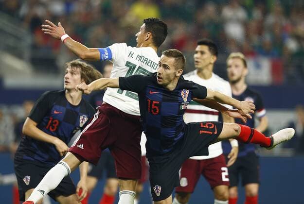 March 27, 2018 - Arlington, Texas, USA - March 27, 2018, Arlington Tx., USA. Hector Moreno (15) of Mexico and Mariko Rog (15) of Croatia fight for position on a corner kick during the second half of the Mexico vs Croatia International Friendly Länderspiel match at ATT Stadium in Arlington, Texas. Mexico vs Croatia - ZUMAl92_ 20180327_zaf_l92_011 Copyright: xRalphxLauerx
