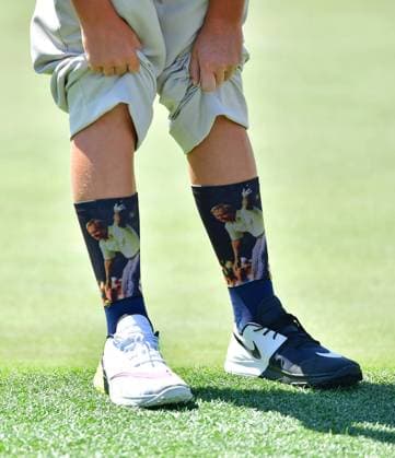 P.J. May bank III shows off his Jack Nicklaus themed socks during the Drive Chip & Putt National Finals at Augusta National Golf Club during Masters week on April 1, 2018 in Augusta, Georgia.  AUG20180401313 KEVINxDIETSCH