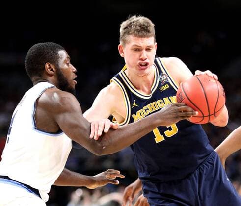 April 2, 2018 - San Antonio, Texas, U.S. - Michigan forward MORITZ WAGNER (13) drives to the basket against Villanova forward ERIC PASCHALL (4) during the NCAA College League USA division 1 men s basketball national championship game between Michigan and Villanova on Monday, at the Alamodome. Villanova Wildcats win NCAA Championship 2018 - ZUMAm67_ 20170119_zaf_m67_067 Copyright: xJunfuxHanx