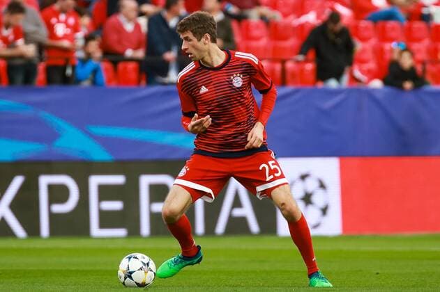 3rd April 2018, Ramon Sanchez Pizjuan, Seville, Spain; UEFA Champions League football, quarter final 1st leg, Sevilla versus Bayern Munich; Thomas Muller of Bayern Munich warms up  ActionPlus12008096
