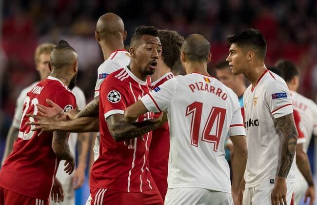 Spain, Sevilla 03.04.2018, UEFA Champions League - 2017 18 Season, Quarter-finals, First leg, Sevilla FC - FC Bayern Muenchen, Jerome Boateng (FCB) Guido Pizarro (FCS) auseinandersetzung ( DeFodi048