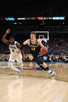 April 2, 2018 - San Antonio, Texas - Michigan Wolverines Moritz Wagner (13) dribbles around Villanova Wildcats Eric Paschall (4) during the first half of the NCAA College League USA Championship game at the Alamodome. San Antonio Express-News Texas News - April 2, 2018 - ZUMAa27_ 20180402_zaf_a27_032 Copyright: xKinxManxHuix