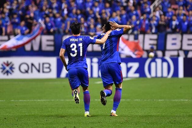 Wang Wei, left, and Mao Jianqing of China s Shanghai Greenland Shenhua celebrate after scoring a goal against Japan s Kashima Antlers in a Group H match during the 2018 AFC Champions League in Shanghai, China, 3 April 2018. A second-half goal and assist from Yuma Suzuki inspired Kashima Antlers to a come-from-behind 2-2 draw with Shanghai Shenhua on Matchday Five of the AFC Champions League on Tuesday. Shanghai Greenland Shenhua plays draw to Kashima Antlers at AFC group match  20180403_27888