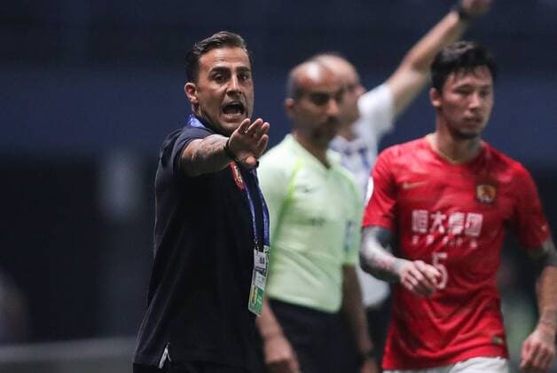 Head coach Fabio Cannavaro of China s Guangzhou Evergrande Taobao FC reacts as he watches his players competing against Thailand s Buriram United FC in a Group G match during the 2018 AFC Champions League in Buriram, Thailand, 3 April 2018. A goal from Edgar Silva earned Buriram United an important 1-1 draw against Guangzhou Evergrande at the Tianhe Stadium in their opening match in Group G of the 2018 AFC Champions League Buriram United plays draw to Guangzhou Evergrande at AFC group match  20180403_51440