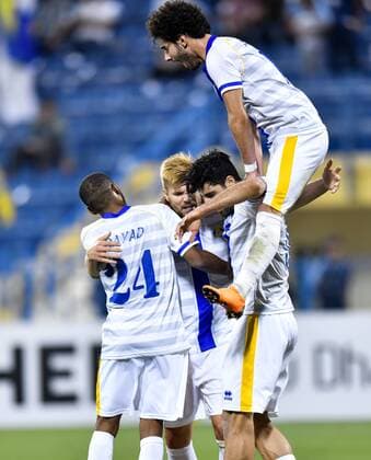 (180404) -- DOHA, April 4, 2018 -- Diogo Amado (2nd L) of Al Gharafa celebrates with teammates during the AFC Champions League Group A soccer match between Qatar s Al Gharafa and Al Jazira FSC of the United Arab Emirates (UAE) at Thani Bin Jassim Stadium in Doha, capital of Qatar, April 3, 2018. Al Jazira FSC won 3-2. ) (SP)QATAR-DOHA-SOCCER-AFC CHAMPIONS LEAGUE Nikku 