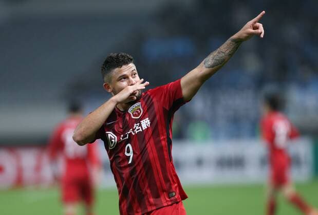 (180404) -- SHANGHAI, April 4, 2018 -- Elkeson of Shanghai SIPG FC celebrates after scoring during the AFC Champions League group F soccer match between China s Shanghai SIPG FC and Japan s Kawasaki Frontale in Shanghai, east China, April 4, 2018. The match ended in a 1-1 draw. ) (SP)CHINA-SHANGHAI-SOCCER-AFC ASIAN CHAMPIONS LEAGUE-SHANGHAI SIPG FC VS KAWASAKI FRONTALE (CN) DingxTing 
