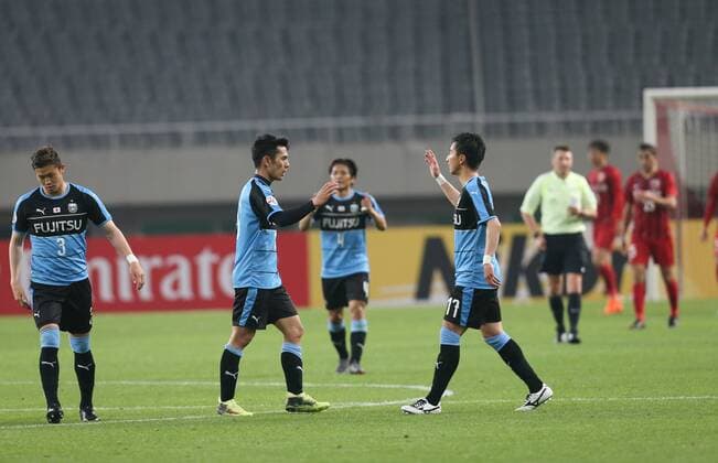 (180404) -- SHANGHAI, April 4, 2018 -- Players of Kawasaki Frontale celebrate after scoring during the AFC Champions League group F soccer match between China s Shanghai SIPG FC and Japan s Kawasaki Frontale in Shanghai, east China, April 4, 2018. The match ended in a 1-1 draw. ) (SP)CHINA-SHANGHAI-SOCCER-AFC ASIAN CHAMPIONS LEAGUE-SHANGHAI SIPG FC VS KAWASAKI FRONTALE (CN) DingxTing 