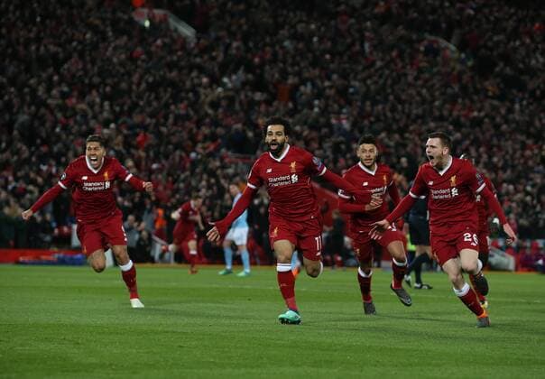 Mohamed Salah of Liverpool (c) celebrates scoring the first goal during the Champions League Quarter Final 1st Leg, match at Anfield Stadium, Liverpool. Picture date: 4th April 2018. Picture credit should read: Simon Bellis Sportimage EDITORIAL USE ONLY. No use with unauthorised audio, video, data, fixture lists, club league logos or live services. Online in-match use limited to 120 images, no video emulation. No use in betting, games or single club league player publications.
