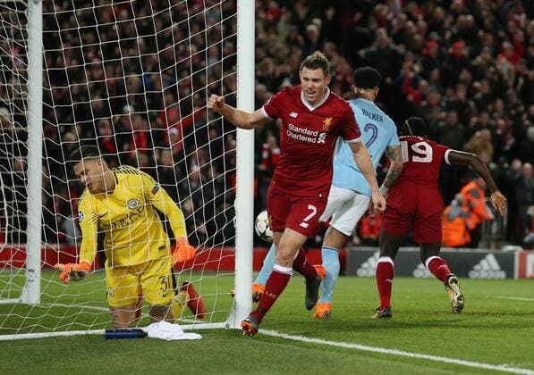 Ederson of Manchester City dejected after Sadio Mane of Liverpool (r) scores the third goal during the Champions League Quarter Final 1st Leg, match at Anfield Stadium, Liverpool. Picture date: 4th April 2018. Picture credit should read: Simon Bellis Sportimage EDITORIAL USE ONLY. No use with unauthorised audio, video, data, fixture lists, club league logos or live services. Online in-match use limited to 120 images, no video emulation. No use in betting, games or single club league player publications.