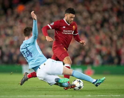 Liverpool v Manchester City UEFA Champions League Quarter Final Alex Oxlade-Chamberlain of Liverpool (right) goes past Aymeric Laporte of Manchester City during the UEFA Champions League Quarter Final match at Anfield, Liverpool Content Not Available For UK Newspapers Copyright: xRussellxHartx FIL-11605-0011