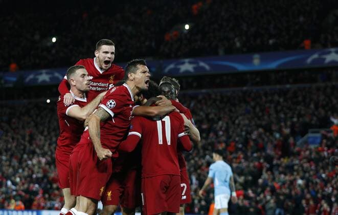 Football - 2017 2018 UEFA Champions League - Quarter-Final, First Leg: Liverpool vs. Manchester City Sadio Mane of Liverpool celebrates scoring the third goal at Anfield. COLORSPORT LYNNE CAMERON 