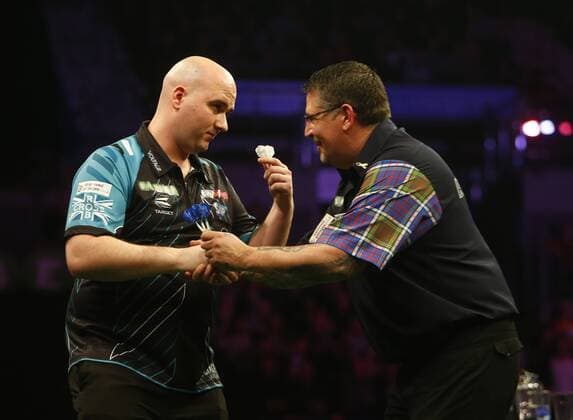 5th April 2018, Echo Arena, Liverpool, England; Unibet Premier League Darts; Rob Cross (ENG) (left) shares a joke with Gary Anderson (SCO) after he had won their match 7-5  ActionPlus12008962