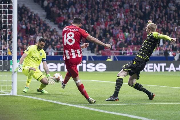 Atletico de Madrid Diego Costa and Sporting de Lisboa Rui Patricio and Jérémy Mathieu during UEFA Europa League match between Atletico de Madrid and Sporting de Lisboa at Wanda Metropolitano in Madrid, Spain. April 05, 2018.  (20180405006)