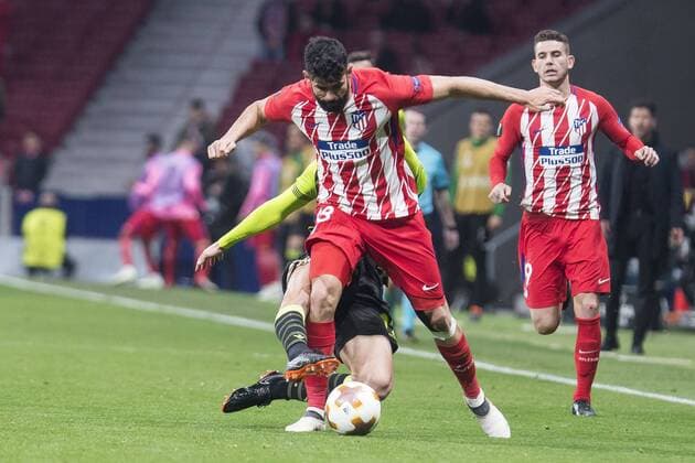 Atletico de Madrid Diego Costa and Sporting de Lisboa Cristiano Piccini during UEFA Europa League match between Atletico de Madrid and Sporting de Lisboa at Wanda Metropolitano in Madrid, Spain. April 05, 2018.  (20180405009)