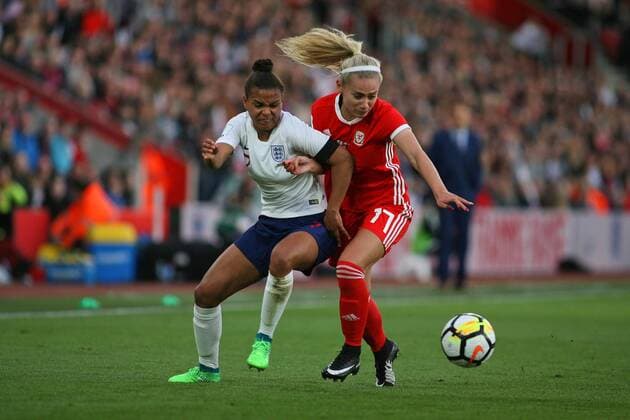 Football - 2017 2018 Womens World Cup Qualifier - UEFA Group One: England vs. Wales Englands Nikita Parris and Charlotte Estcourt of Wales tussle for the ball at St Mary s COLORSPORT SHAUN BOGGUST 