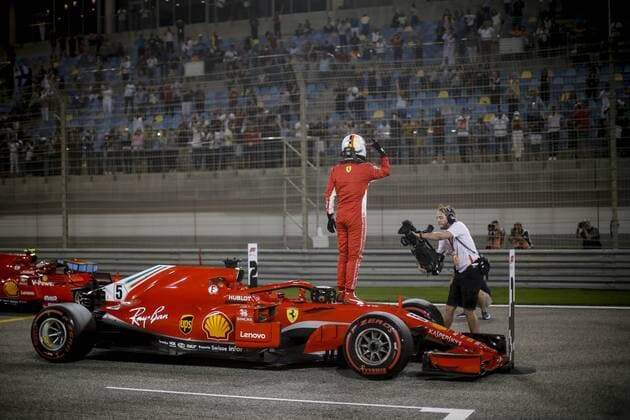 April 7, 2018 - Sakhir, Kingdom of Bahrain - SEBASTIAN VETTEL of Scuderia Ferrari celebrates pole position after the 2018 FIA Formula 1 Bahrain Grand Prix qualifying session at Bahrain International Circuit in Sakhir, Kingdom of Bahrain. Bahrain Grand Prix 2018 - Qualifying - ZUMAg147 20180407_zap_g147_041 Copyright: xJamesxGasperottix