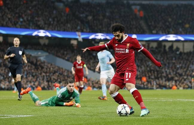 Liverpool s Mohamed Salah scoring his sides opening goal during the Champions League Quarter Final 2nd Leg match at the Etihad Stadium, Manchester. Picture date: 10th April 2018. Picture credit should read: David Klein Sportimage EDITORIAL USE ONLY. No use with unauthorised audio, video, data, fixture lists, club league logos or live services. Online in-match use limited to 120 images, no video emulation. No use in betting, games or single club league player publications.