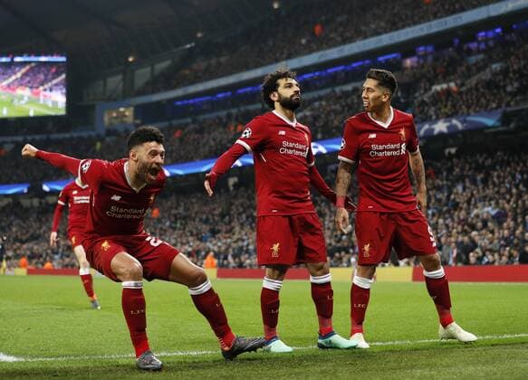 Liverpool s Mohamed Salah celebrates scoring his sides opening goal during the Champions League Quarter Final 2nd Leg match at the Etihad Stadium, Manchester. Picture date: 10th April 2018. Picture credit should read: David Klein Sportimage EDITORIAL USE ONLY. No use with unauthorised audio, video, data, fixture lists, club league logos or live services. Online in-match use limited to 120 images, no video emulation. No use in betting, games or single club league player publications.