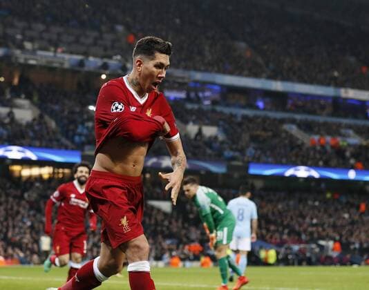 Liverpool s Roberto Firmino celebrates scoring his sides second goal during the Champions League Quarter Final 2nd Leg match at the Etihad Stadium, Manchester. Picture date: 10th April 2018. Picture credit should read: David Klein Sportimage EDITORIAL USE ONLY. No use with unauthorised audio, video, data, fixture lists, club league logos or live services. Online in-match use limited to 120 images, no video emulation. No use in betting, games or single club league player publications.