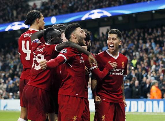 Liverpool s Roberto Firmino celebrates scoring his sides second goal during the Champions League Quarter Final 2nd Leg match at the Etihad Stadium, Manchester. Picture date: 10th April 2018. Picture credit should read: David Klein Sportimage EDITORIAL USE ONLY. No use with unauthorised audio, video, data, fixture lists, club league logos or live services. Online in-match use limited to 120 images, no video emulation. No use in betting, games or single club league player publications.