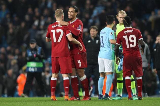 Manchester City v Liverpool UEFA Champions League Quarter Final Virgil van Dijk of Liverpool celebrates with Ragnar Klavan after their teams win against Manchester City after the UEFA Champions League Quarter Final match at the Etihad Stadium, Manchester. Content Not Available For UK Newspapers Copyright: xMichaelxSedgwickx FIL-11629-0025