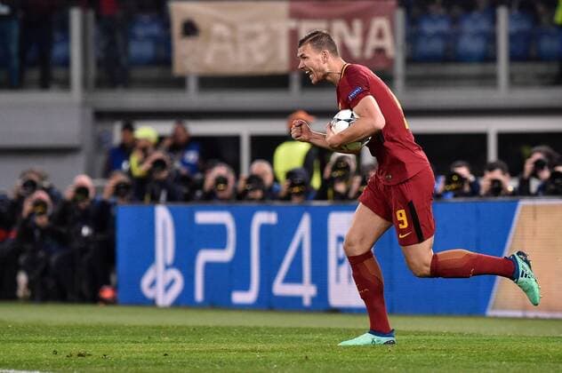 Fußball, CL, AS Rom - FC Barcelona April 10, 2018 - Rome, Italy - Edin Dzeko of Roma celebrates scoring first goal during the UEFA Champions League Quarter Final match between Roma and FC Barcelona Barca at Stadio Olimpico, Rome, Italy on 10 April 2018. Roma v FC Barcelona.UEFA Champions League Quarter Final .10 04 2018.  - ZUMAn230 20180410_zaa_n230_391 Copyright: xGiuseppexMaffiax