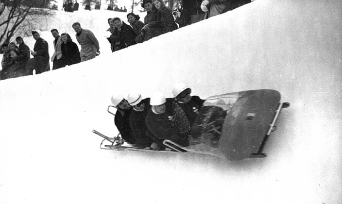 - SANKT MORITZ, SWITZERLAND: (FILE) This file picture dated 08 February 1948 shows the Belgian team in four men bobsleigh competition, M. Houber, F. Mansveld, G. Niels and J.Mouvet take the famous sunny corner at the Winter Olympic Games Olympische Spiele Olympia OS in Sankt Moritz, Switzerland. ARCHIVES BELGAxARCHIVES  x32092254x