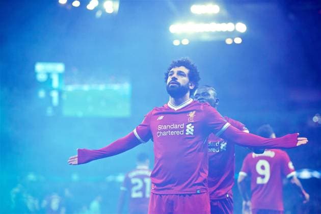 (180411) -- MANCHESTER, April 11, 2018 () -- Liverpool s Mohamed Salah celebrates after scoring during the UEFA Champions League quarterfinal second leg soccer match between Manchester City and Liverpool in Manchester, Britain, on April 10, 2018. Liverpool won 5-1 on aggregate and advanced to the semifinal. () FOR EDITORIAL USE ONLY. NOT FOR SALE FOR MARKETING OR ADVERTISING CAMPAIGNS. NO USE WITH UNAUTHORIZED AUDIO, VIDEO, DATA, FIXTURE LISTS, CLUB LEAGUE LOGOS OR LIVE SERVICES. ONLINE IN-MATCH USE LIMITED TO 45 IMAGES, NO VIDEO EMULATION. NO USE IN BETTING, GAMES OR SINGLE CLUB LEAGUE PLAYER PUBLICATIONS.) (SP)BRITAIN-MANCHESTER-SOCCER-UEFA CHAMPIONS LEAGUE-MANCHESTER CITY VS LIVERPOOL Xinhua