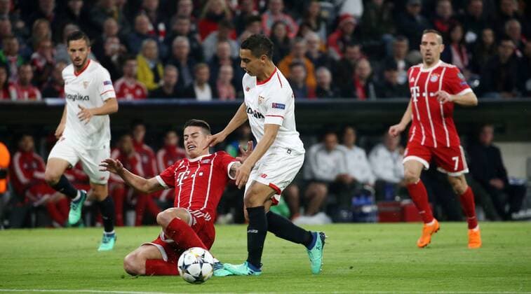 UEFA Champions League, FC Bayern München - Sevilla FC, Viertelfinale Rueckspiel Quarter-Finals 2nd leg, 11.04.2018 in der Allianz Arena, Saison 2017 18, xmdx, Wissam BEN YEDDER (9, Sevilla FC), James RODRIGUEZ (11, FC Bayern Muenchen) FC Bayern Muenchen - Sevilla FC