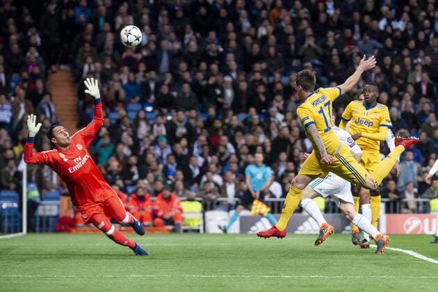 Real Madrid Keylor Navas and Juventus Mario Mandzukic goal during Champion League match between Real Madrid and Juventus at Santiago Bernabeu Stadium in Madrid, Spain. April 11, 2018.  (20180411003)