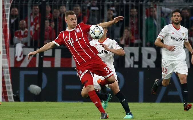 UEFA Champions League, FC Bayern München - Sevilla FC, Viertelfinale Rueckspiel Quarter-Finals 2nd leg, 11.04.2018 in der Allianz Arena, Saison 2017 18, xmdx, Wissam BEN YEDDER (9, Sevilla FC), Joshua KIMMICH (32, FC Bayern Muenchen) FC Bayern Muenchen - Sevilla FC