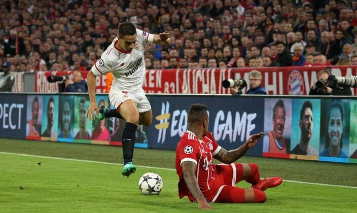 UEFA Champions League, FC Bayern München - Sevilla FC, Viertelfinale Rueckspiel Quarter-Finals 2nd leg, 11.04.2018 in der Allianz Arena, Saison 2017 18, xmdx, Wissam BEN YEDDER (9, Sevilla FC), Jerome BOATENG (17, FC Bayern Muenchen) FC Bayern Muenchen - Sevilla FC