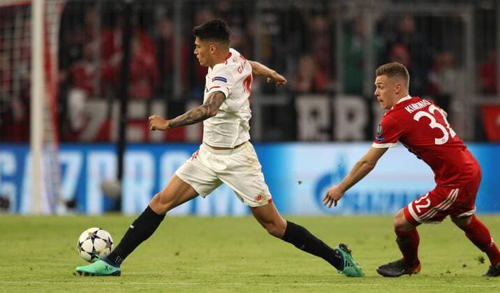 UEFA Champions League, FC Bayern München - Sevilla FC, Viertelfinale Rueckspiel Quarter-Finals 2nd leg, 11.04.2018 in der Allianz Arena, Saison 2017 18, xmdx, Wissam BEN YEDDER (9, Sevilla FC), Joshua KIMMICH (32, FC Bayern Muenchen) FC Bayern Muenchen - Sevilla FC