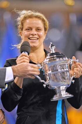 - NEW YORK, USA: Belgian tennis player Kim Clijsters celebrates with her trophy after winning her final match against Russian Vera Zvonareva, during the women s singles at the US Open Grand Slam Tennis Tournament, at Flushing Meadows, in New York City, USA, Saturday 11 September 2010. Clijsters won 6-2, 6-1. PHILIPPExBUISSIN  x22279070x