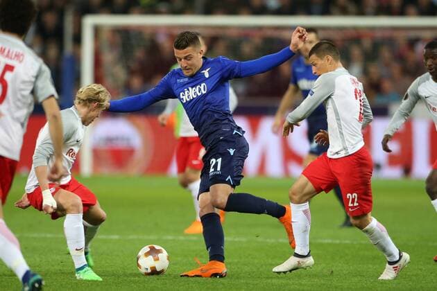 SOCCER - EL, RBS vs Lazio SALZBURG,AUSTRIA,12.APR.18 - SOCCER - UEFA Europa League, quarterfinal, Red Bull Salzburg vs SS Lazio. Image shows Xaver Schlager (RBS), Sergej Milinkovic Savic (Lazio) and Stefan Lainer (RBS). GEPAxpictures xMathiasxMandl