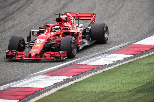 German F1 Sebastian Vettel of Ferrari steers his car during a practice session for the 2018 Formula 1 Chinese Grand Prix at the Shanghai International Circuit in Shanghai, China, 13 April 2018. F1 drivers in full swing for Chinese Grand Prix in practice session  20180413_85661