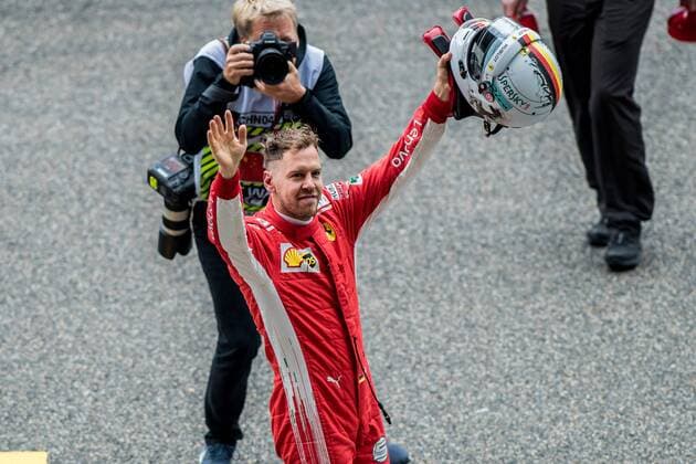German F1 Sebastian Vettel of Ferrari reacts after winning the pole position in the qualifying session for the 2018 Formula One Chinese Grand Prix at the Shanghai International Circuit in Shanghai, China, 14 April 2018. It s still early, but it looks like Ferrari is back. Ferrari s Sebastian Vettel claimed pole position for Sunday s Chinese Grand Prix, where the German will be going for his third straight victory to open the Formula One season. Vettel and Ferrari teammate Kimi Raikkonen will start on the first row in Shanghai. Mercedes, which has dominated the last four seasons, will start on the second row with Valtteri Bottas ahead of No. 4 Lewis Hamilton - the defending and four-time series champion. The famous Italian team has not won a season title in 11 years with Kimi Raikkonen champion in 2007. But Bottas is already hinting that rival Ferrari is the team to beat. Vettel takes pole in China, and Ferrari looks like it s back 