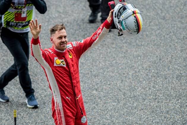 German F1 Sebastian Vettel of Ferrari reacts after winning the pole position in the qualifying session for the 2018 Formula One Chinese Grand Prix at the Shanghai International Circuit in Shanghai, China, 14 April 2018. It s still early, but it looks like Ferrari is back. Ferrari s Sebastian Vettel claimed pole position for Sunday s Chinese Grand Prix, where the German will be going for his third straight victory to open the Formula One season. Vettel and Ferrari teammate Kimi Raikkonen will start on the first row in Shanghai. Mercedes, which has dominated the last four seasons, will start on the second row with Valtteri Bottas ahead of No. 4 Lewis Hamilton - the defending and four-time series champion. The famous Italian team has not won a season title in 11 years with Kimi Raikkonen champion in 2007. But Bottas is already hinting that rival Ferrari is the team to beat. Vettel takes pole in China, and Ferrari looks like it s back 