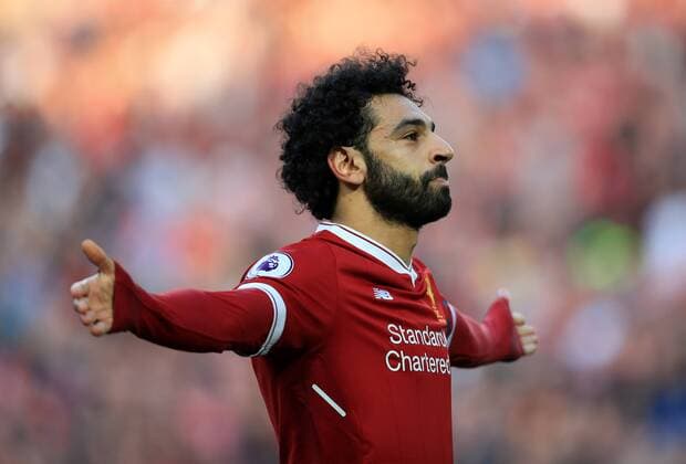 14th April 2018, Anfield, Liverpool, England; EPL Premier League football, Liverpool versus AFC Bournemouth; Mohammed Salah of Liverpool celebrates his headed goal in front of the Kop for 2-0 in the 69th minute  ActionPlus12014041