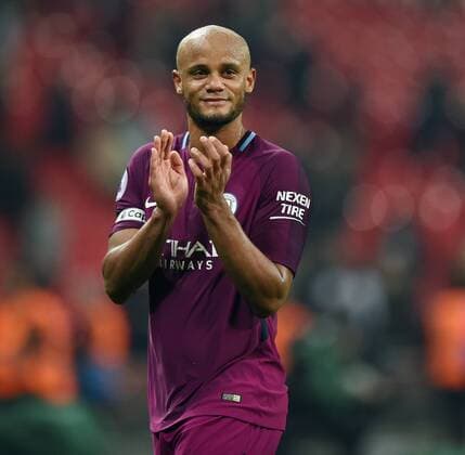 Vincent Kompany of Manchester City celebrates at the end of the premier league match at the Wembley Stadium, London. Picture date 14th April 2018. Picture credit should read: Robin Parker Sportimage EDITORIAL USE ONLY. No use with unauthorised audio, video, data, fixture lists, club league logos or live services. Online in-match use limited to 120 images, no video emulation. No use in betting, games or single club league player publications. HIP_1504